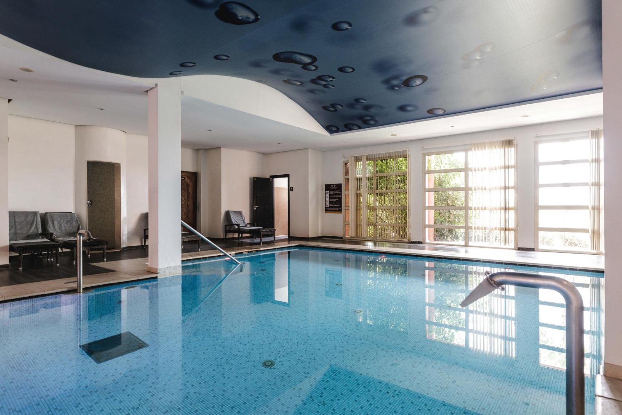 Kenzi Menara Palace & Resort Марракеш Екстер'єр фото The swimming pool at the hotel