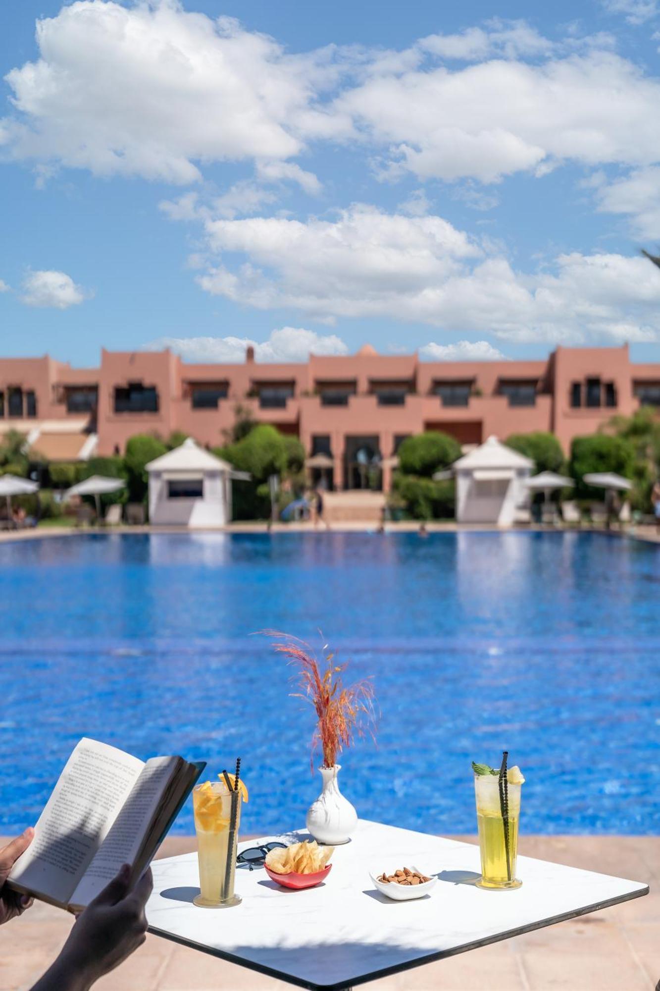 Kenzi Menara Palace & Resort Марракеш Екстер'єр фото The swimming pool at the hotel
