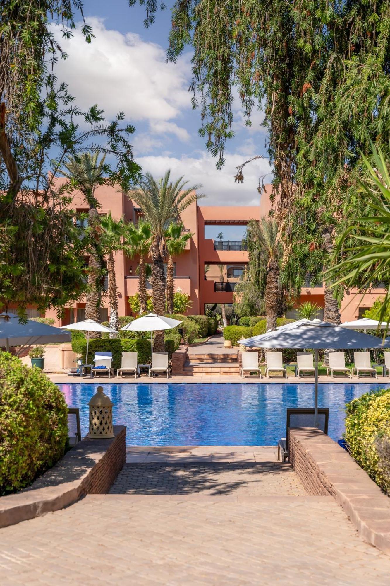 Kenzi Menara Palace & Resort Марракеш Екстер'єр фото The swimming pool at the hotel