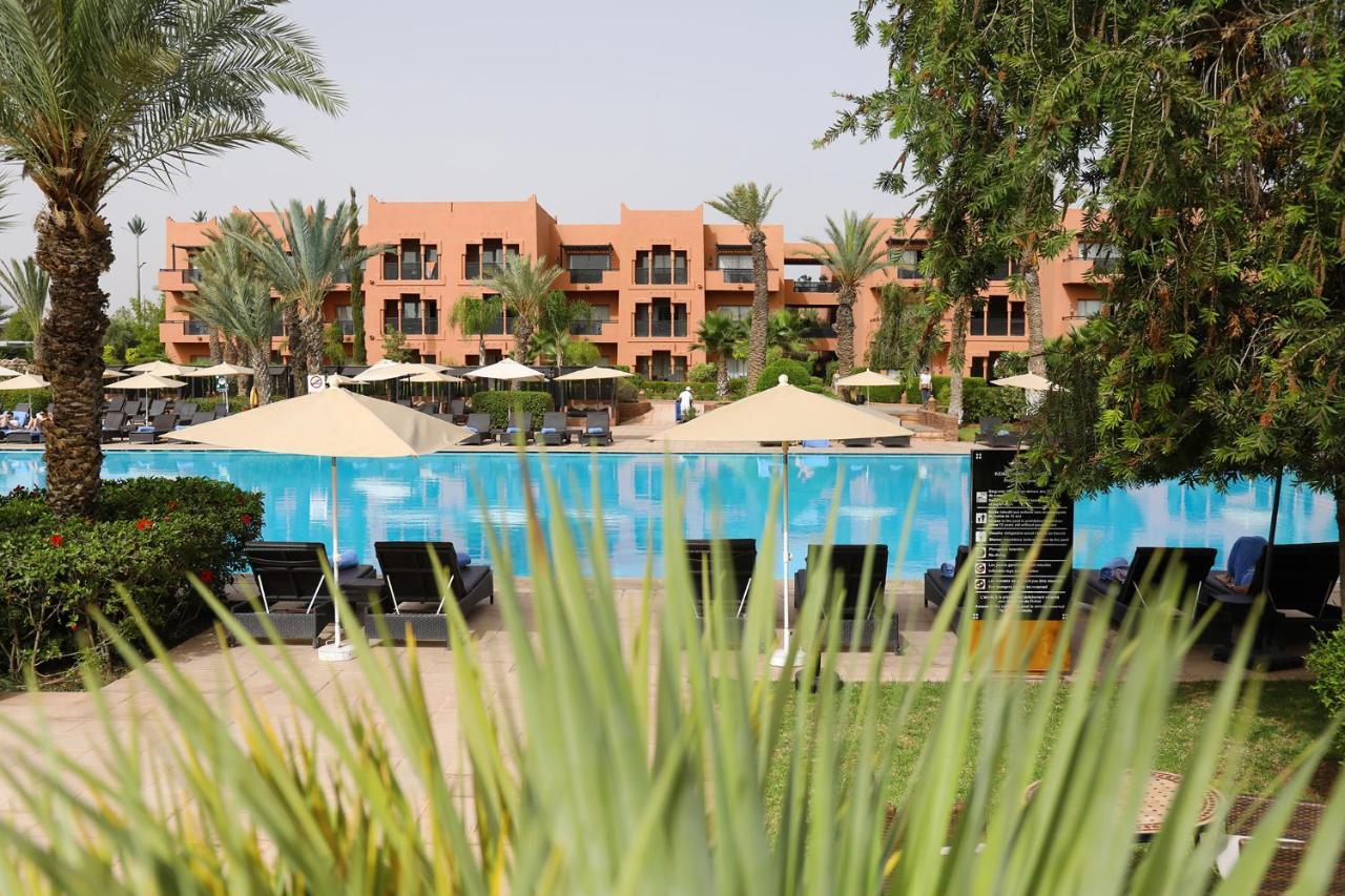 Kenzi Menara Palace & Resort Марракеш Екстер'єр фото The swimming pool at the hotel