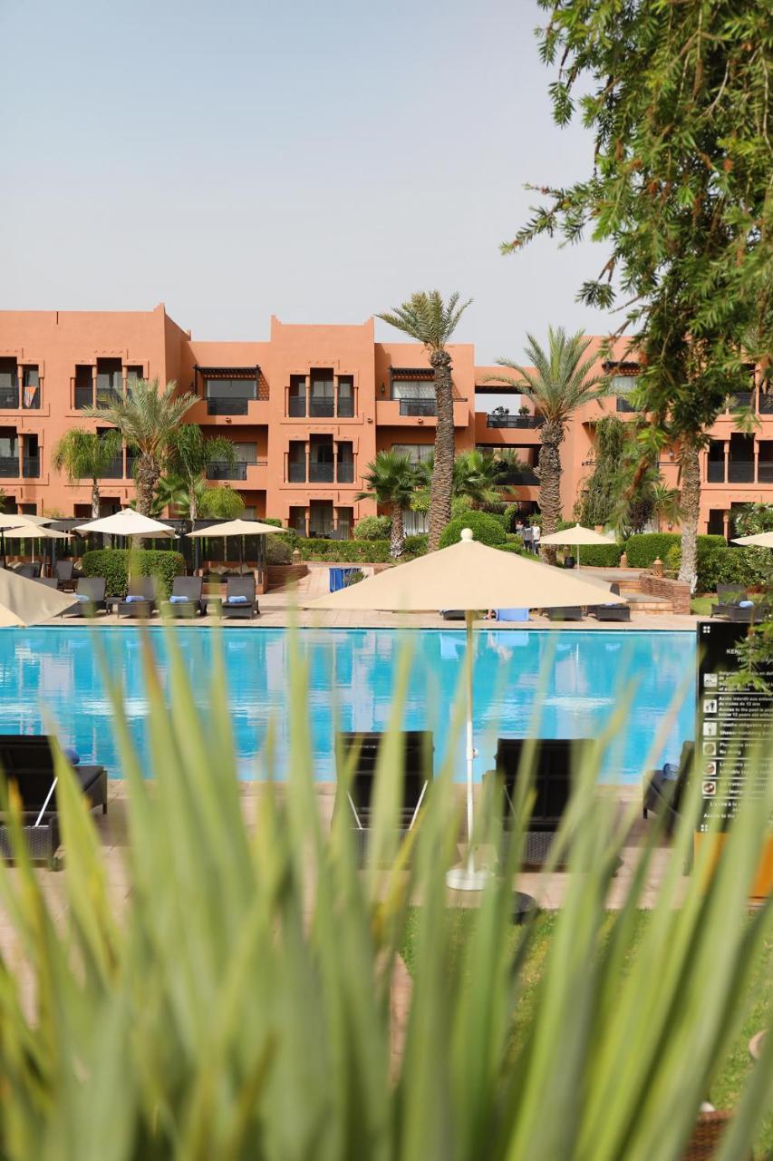 Kenzi Menara Palace & Resort Марракеш Екстер'єр фото The swimming pool at the hotel